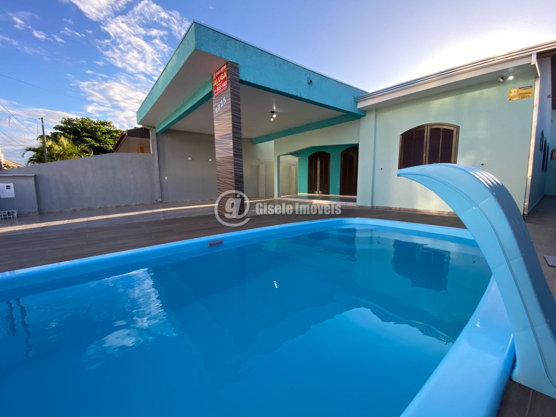 Foto 1 - CASA COM PISCINA - BALNEÁRIO IPANEMA - REF 211