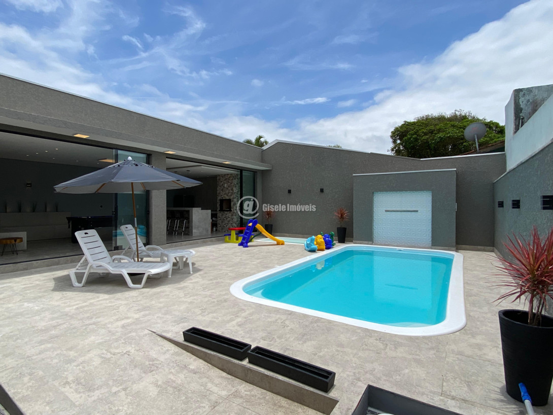 Foto 1 - CASA COM PISCINA - BALNEÁRIO IPANEMA - REF 209