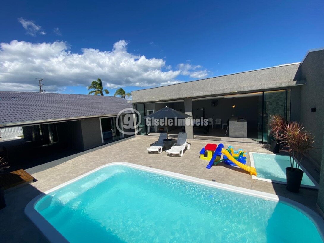 Foto 1 - CASA COM PISCINA - BALNEÁRIO IPANEMA - REF 209