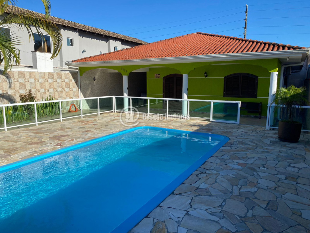 Foto 1 - CASA COM PISCINA - BALNEÁRIO IPANEMA - REF 210
