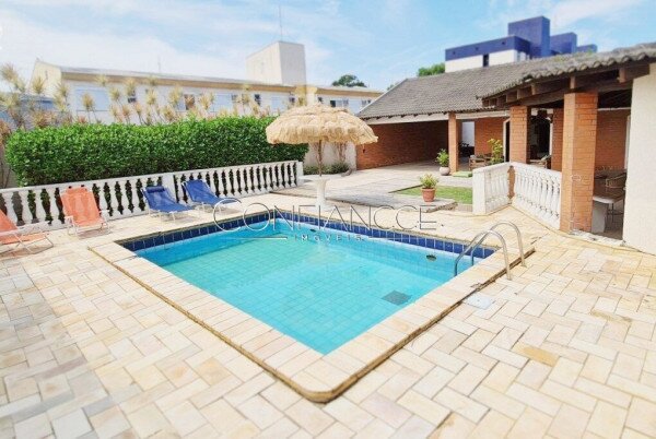 Casa com piscina para venda em Caiobá, Matinhos - PR | Confiancce Imóveis